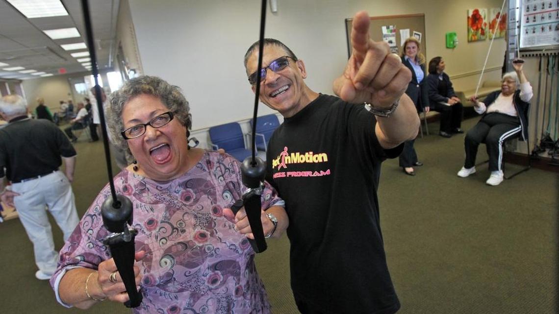 Glorinda Olivera 74, does some training with Physical Therapist Mario Guerra at the CAC-Florida Medical Center in Hialeah in November 2103. Social activities are a big draw for seniors on Medicare Advantage, which are run by private health insurers and are very popular with South Florida seniors.