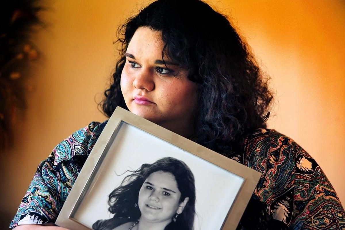 Haylee Kalick holds a photo of herself when she was 14 and life was a little easier. Haylee, 21, is diagnosed with Tourette Syndrome, bipolar disorder, obsessive compulsive disorder and attention deficit hyperactivity disorder. But she has not been committed to a hospital psychiatric ward in more than two years since she signed up for Medicaid, which pays for her prescription medications, which can cost about $1,500 a month, and psychological counseling. Her father, Bruce Kalick, is worried that Medicaid cuts proposed in Congress would send his daughter spiraling back to instability.