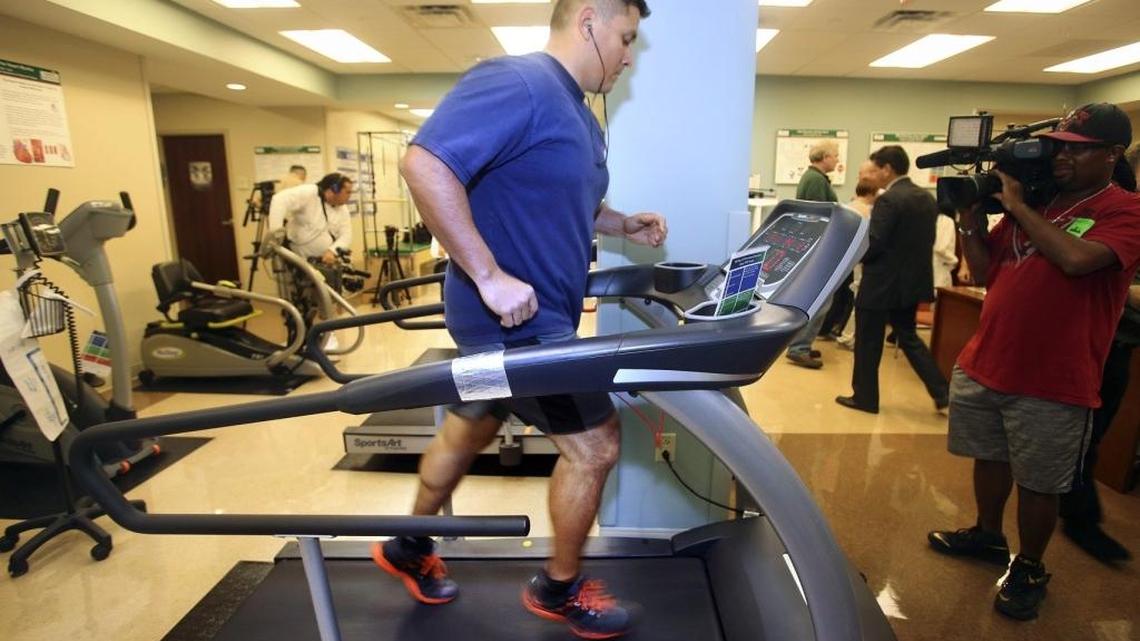 
Noel Zuniga, 44, runs on a treadmill at the UHealth Cardiovascular Recovery Program at the University of Miami Hospital in Miami on Friday, Oct. 2, 2015. Earlier, Zuniga and his wife Diana were at a press conference with the team members who gave Zuniga a second chance at life after his major heart attack in 2013 while serving as an NCIS Agent in charge of the U.S. Embassy in Panama. 
