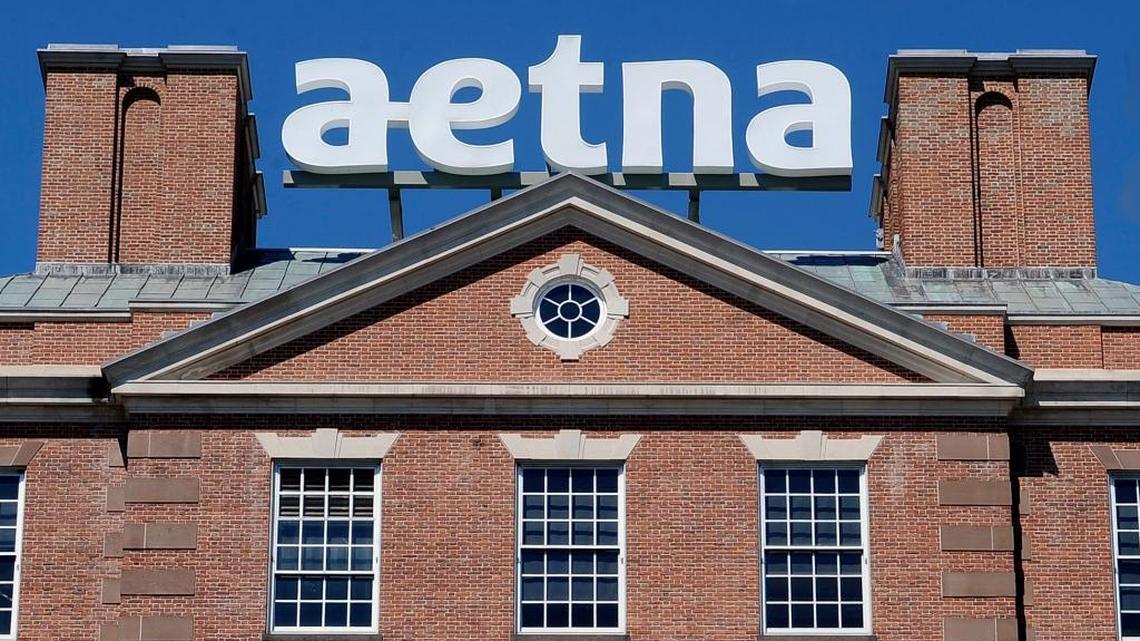 A 2014 photo of a sign for Aetna Inc. atop a building at the company headquarters in in Hartford, Conn. Health insurer Aetna will become the latest health insurer to reduce participation in the Affordable Care Act’s insurance exchanges when it trims its presence to four states for 2017 — down from 15 this year. Aetna will not sell ACA plans in Florida next year.