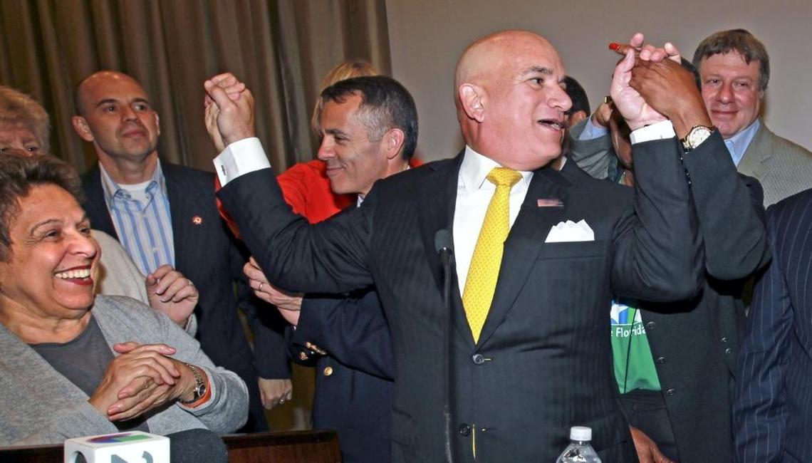 In this November 2013 photo, Jackson Health System CEO Carlos Migoya celebrates with University of Miami’s then-President Donna Shalala (left) after Miami-Dade voters approved a referendum to upgrade the county’s public hospital system with $830 million in bonds payable through a property tax hike.