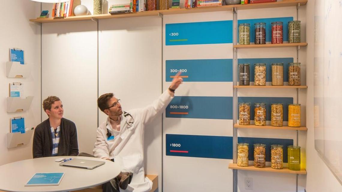 Dr. Craig McDougall of ZOOM+ discussing food as medicine with a patient