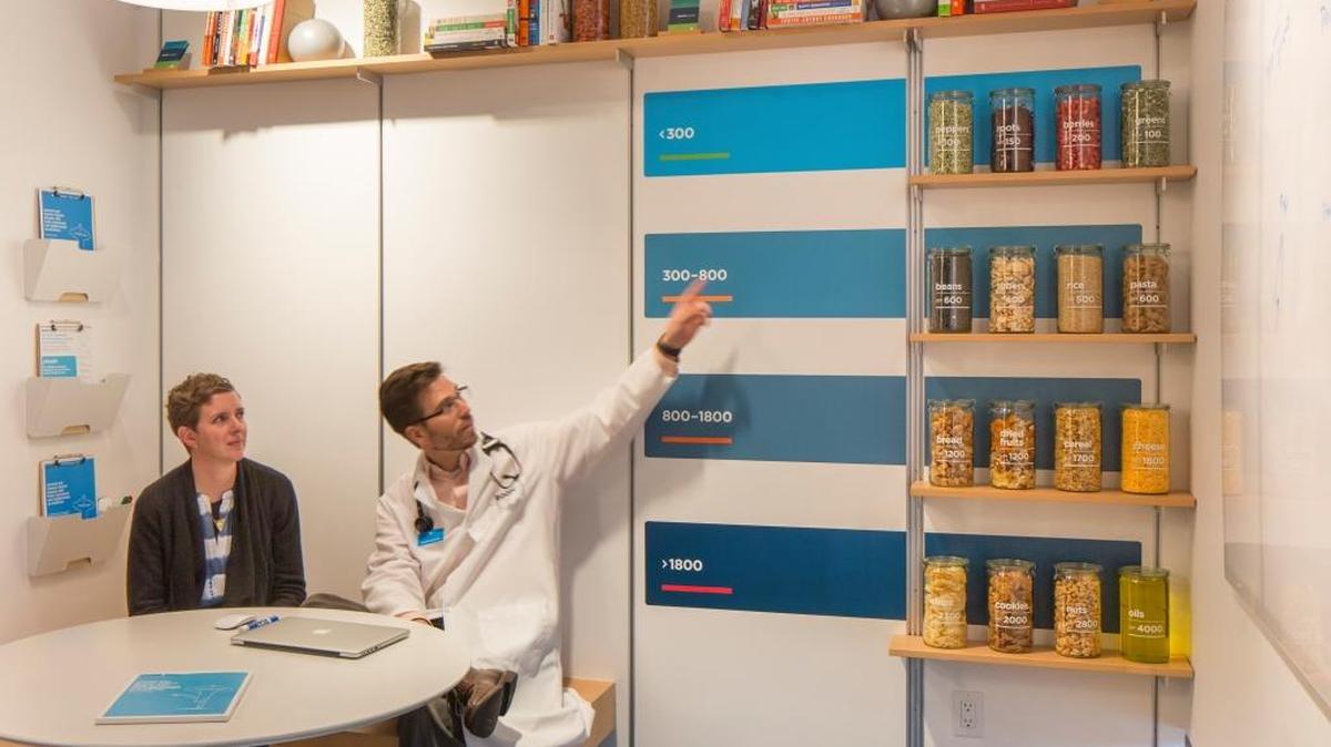 Dr. Craig McDougall of ZOOM+ discussing food as medicine with a patient