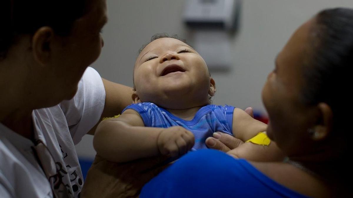Scientists with the Centers for Disease Control and Prevention estimate that 6 percent of completed pregnancies among mothers infected with Zika while pregnant led to one or more birth defects potentially related to the virus. In this February 2016 photo, Caio Julio Vasconcelos, who was born with microcephaly, undergoes physical therapy at the Institute for the Blind in Brazil. Vasconcelos was born to a mother who contracted Zika during her pregnancy.
