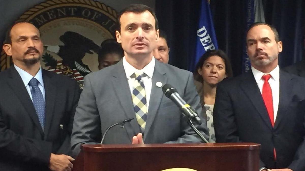 Wifredo A. Ferrer, United States Attorney for the Southern District of Florida, announces the filing of federal charges against more than 100 defendants in 81 separate cases, dealing with over 30,000 stolen identities and the intended theft of over $60 million dollars from individuals, businesses and government agencies through fraudulent schemes, during a press conference at the U.S. Attorney's office in Miami on Tuesday, Jan. 31, 2017.
