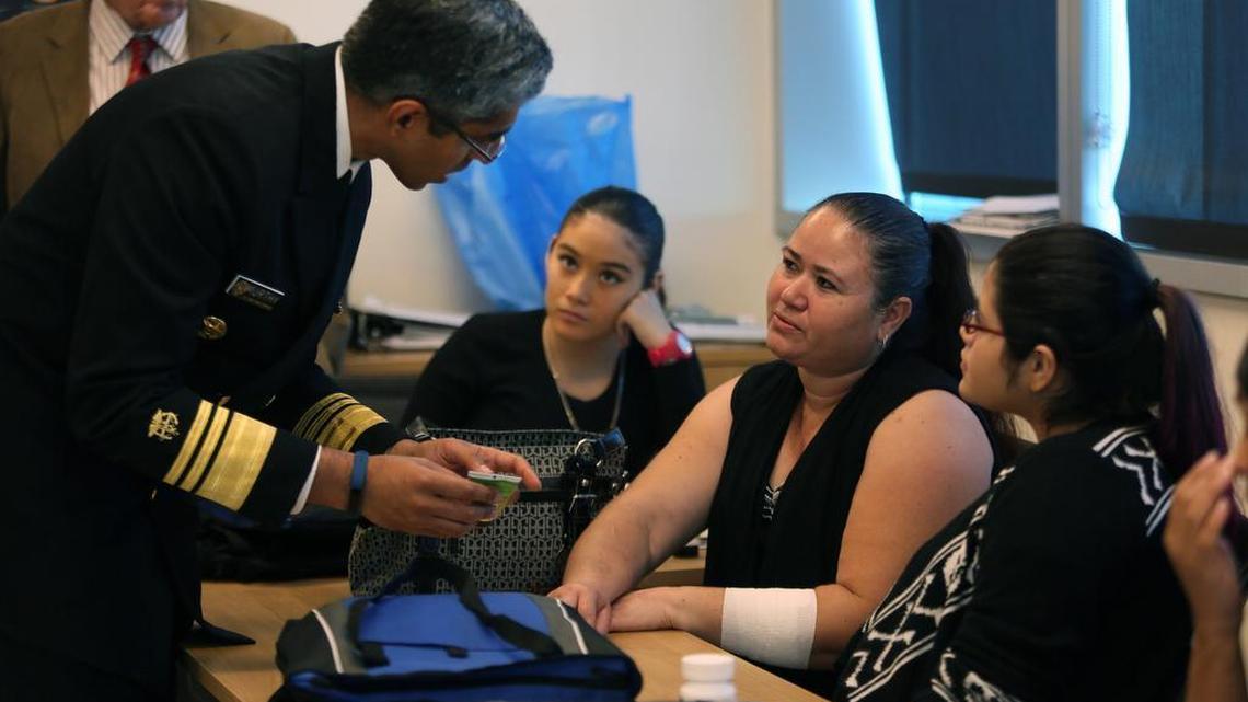 Left to right, U.S. Surgeon General Vivek H. Murthy speaking with Blanca Irahera, center, at Borinquen Medical Center on Friday, August 12.