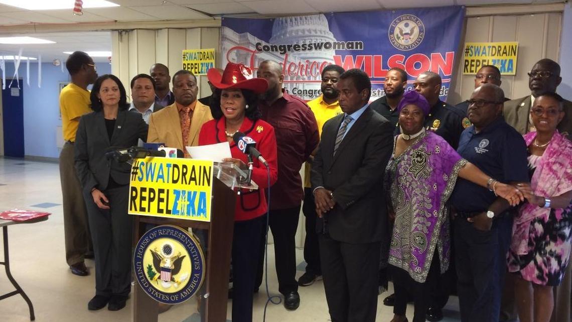 U.S. Rep. Frederica Wilson of Florida, wearing a red hat, visited the Belafonte TACOLCY Center in Miami on Tuesday, Oct. 18, 2016 to urge residents to take heed that mosquitoes are spreading Zika in a one-square-mile area of Little River and Liberty City. Wilson said she would urge Florida Gov. Rick Scott to visit the area and give it the same attention as Miami Beach and Wynwood.