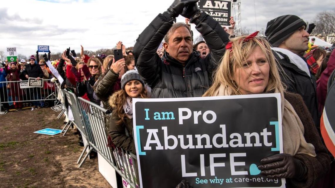 Mary Kolar, 58, from Tequesta, listens to Vice President Mike Pence as thousands of pro-life marchers crowd the streets near the National Mall during the March for Life Friday, Jan. 27, 2017 in Washington, D.C.