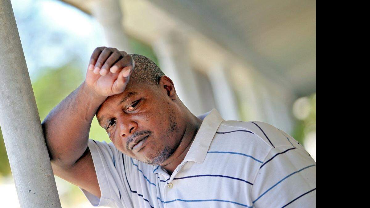 
Timothy Lane, 47, has diabetes, high blood pressure, swelling in his knees and chronic back pain. 
