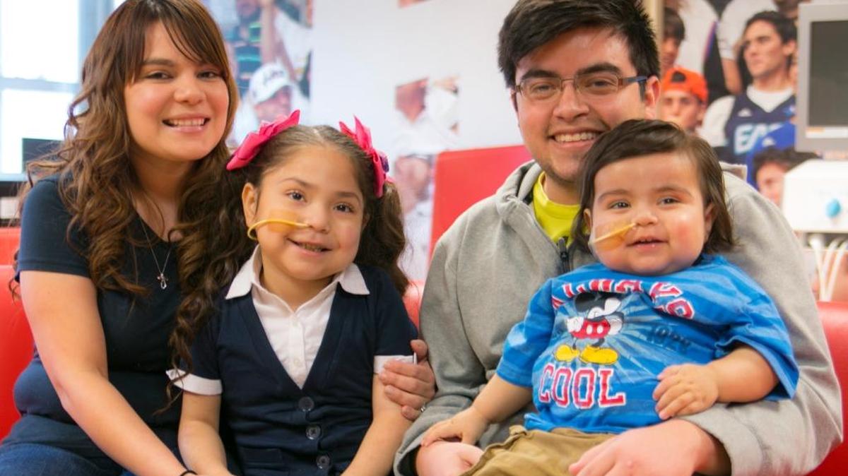 Julissa Cerda, her daughter Delilah Valdez, husband Jose Garza, and their son, Liam Garza, at Jackson Memorial Hospital, where surgeons with the University of Miami Health System performed an eight-organ transplant in February to save Liam’s life. Liam is diagnosed with a rare and fatal congenital disease known as Berdon syndrome.