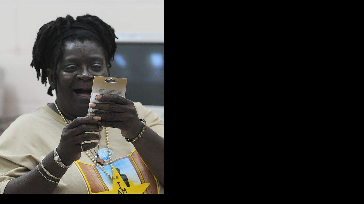 
Anita Debres Martin won a $25 gift for being creative at a practice job interview held at the Chapman Center homeless center at 1550 North Miami Avenue in 2009.
