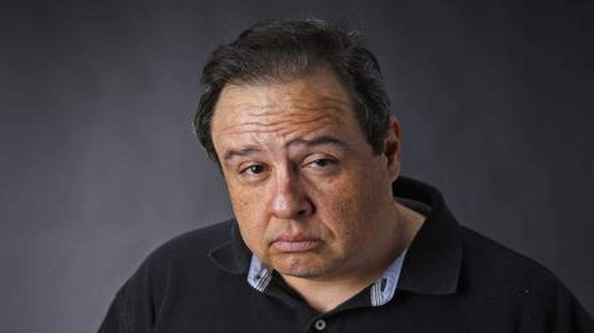 
Sal Morales, a Kendall man whose hospital bills from Baptist Health South Florida have him pretty confused about how much was paid for his ER visit in May -- and how much he still owes on Thursday, Sept. 11, 2014.
