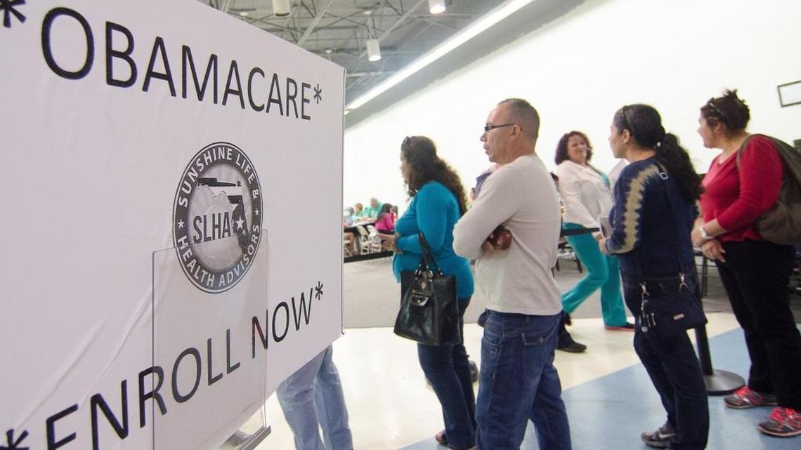 Florida consumers wait outside an insurance brokerage in December 2014 at the Mall of the Americas, where they applied for an Affordable Care Act plan through the federal insurance exchange at healthcare.gov.