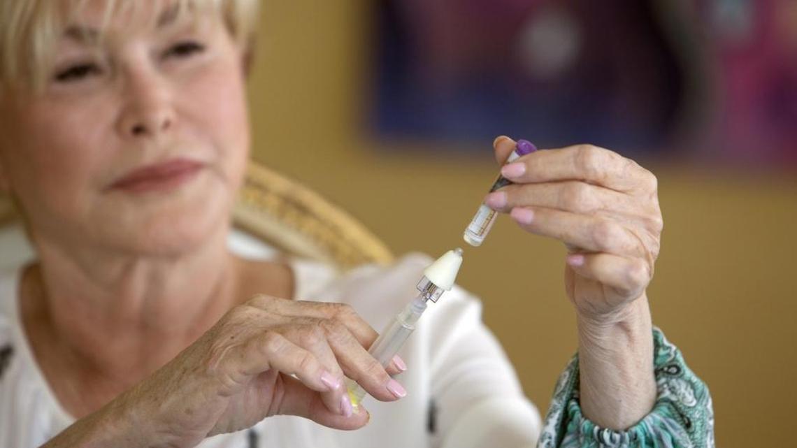 Joy Fishman, a Miami woman whose husband invented Narcan, the ‘save shot’ for people who are overdosing on opioids, is raising money for a needle exchange program in Miami-Dade County. She lost her son, Jonathan Stampler, to a heroin overdose 12 years ago. Narcan might have saved him, but it wasn't administered. Fishman demonstrates how to use Narcan with a nasal applicator. She carries a dose in her purse and wants to make it widely available as part of the needle exchange program.