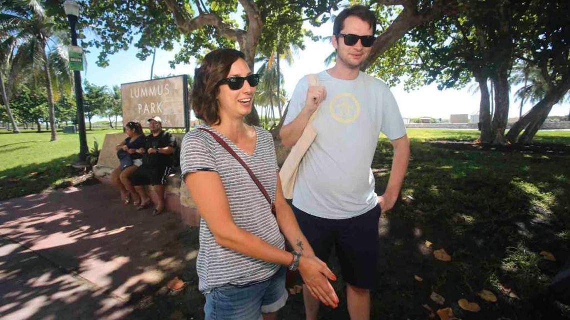 Alison Nunis and Richard Firth, a Savannah, Georgia, married couple vacationing in Miami Beach, talk about the presence of the Zika virus in Miami Beach on Saturday morning, Aug. 20, 2016. They are at Lummus Park in South Beach, within a 1.5-square-mile area in which active transmission of the mosquito-borne virus was announced one day earlier. "Right now we're not terribly worried," said Nunis, 31. "We'll buy some bug spray."