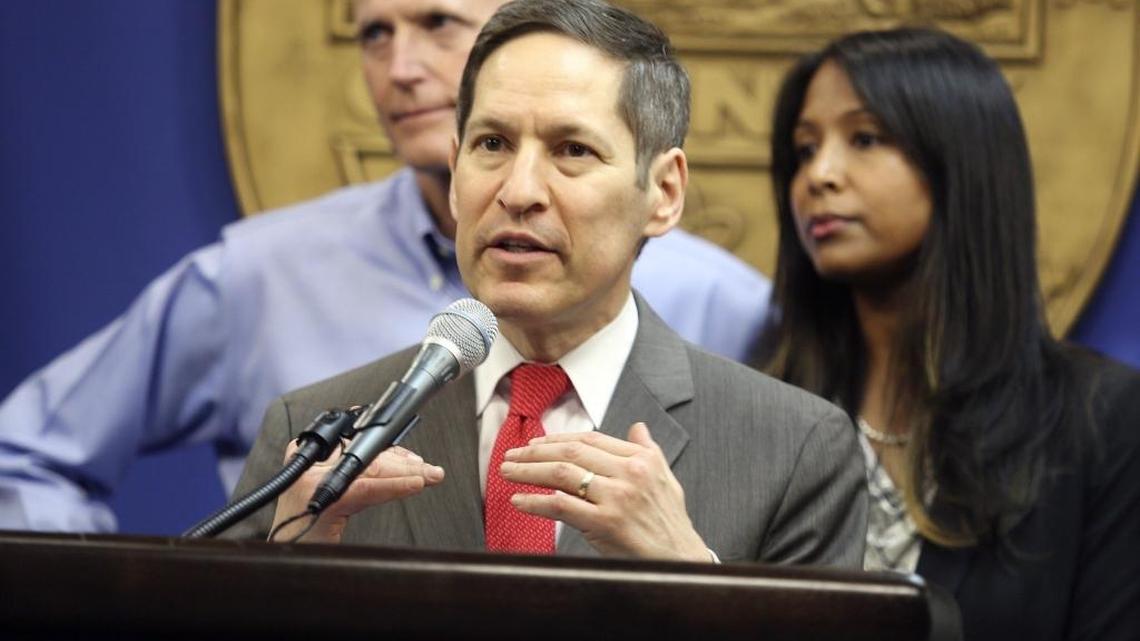 Dr. Tom Frieden, director of the Centers for Disease Control and Prevention (CDC), center, with Florida Gov. Rick Scott and Florida Surgeon General Dr. Celeste Philip, speaks about local efforts to combat the Zika virus, during a press conference in August 2016 at the Miami-Dade County Emergency Operations Center. Frieden said Tuesday that Zika virus likely will become endemic in Western Hemisphere.