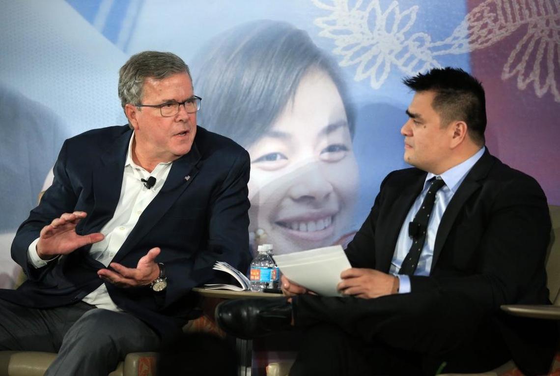 Florida Gov. Jeb Bush and Pulitzer Prize-winning journalist Jose Antonio Vargas speak at the University of Miami Newman Alumni Center on Tuesday, Nov. 28, 2017.