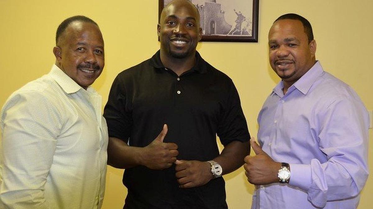 Ed Brown (left), is the newly chosen Opa-locka city manager. At the far right is the late Commissioner Terence Pinder.