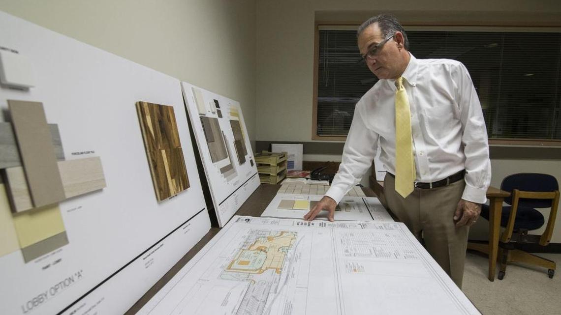 Judge Steven Leifman checks the architecture floorplans as he looks beyond the Sept. 7 county commissioners vote and into the future renovations.