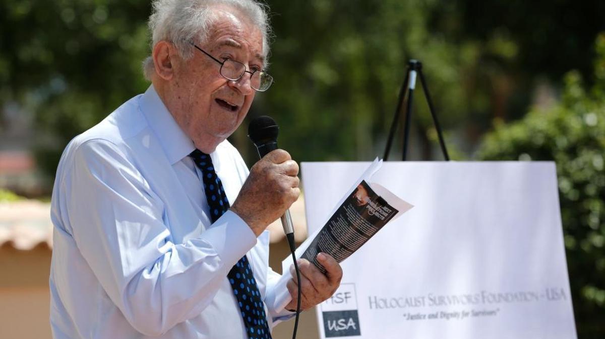 Holocaust survivor David Schaecter, president of the Holocaust Survivors Foundation USA, speaks during a news conference about German insurance giant Allianz’s decision to drop sponsorship of a professional golf tournament in Boca Raton. Survivors say that this could renew momentum for their years-long effort to gain the right to sue the company over stolen Jewish policies during the Nazi era.