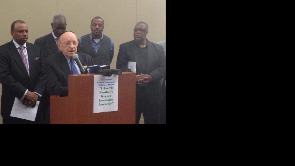 
Rabbi Solomon Schiff, surrounded by several Miami-Dade faith leaders, speaks at the ‘I Am My Brother's Keeper Interfaith Assembly,’ Tuesday, saying there is no place for hate.
