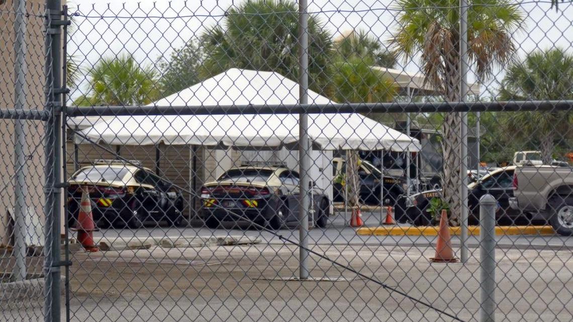Florida Highway Patrol cars sit in a secure lot at the headquarters of Miami-Dade's Troop E.