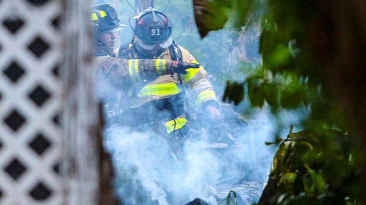 
Palm Beach County Firefighters putting out fire after plane crashed into mobile home in Lake Worth. 
