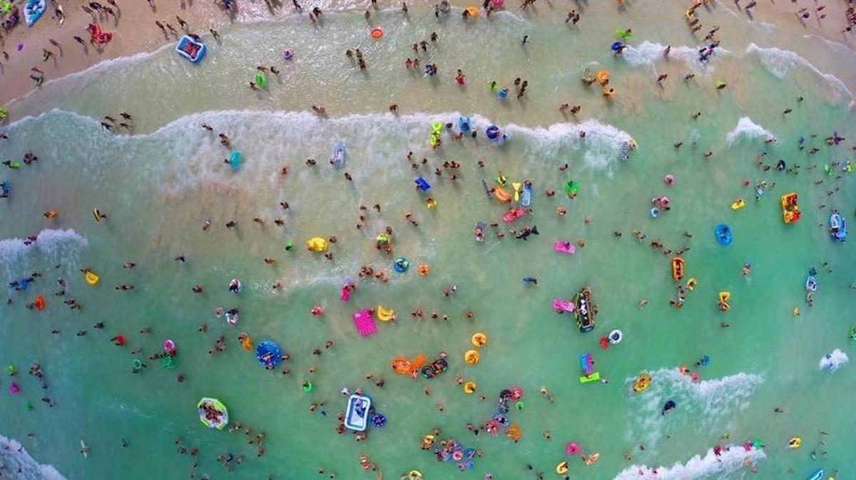 drone view of ‘Floatopians’ taking part in the non-sanctioned Floatopia Miami event on Miami Beach in 2014. Floatopia touts a fun atmosphere on the beaches by encouraging people to bring rafts and other floats to the beach for a communal experience.