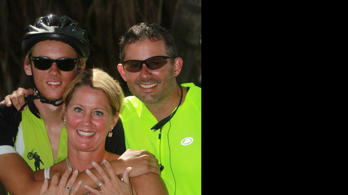 
Reese Jamison, Jr back left, and his dad Reese Jamison right, and his mother Christine Jamison, front, at Piecrest Gardens park, at the 10th annual Paul Anderson 650-mile Bike Ride to raise awareness for the Paul Anderson Youth Home, for troubled youth in Vidalia, Ga.The ride started in Key West, and came through Miami on Friday, July 17, 2015, headed to Georgia.
