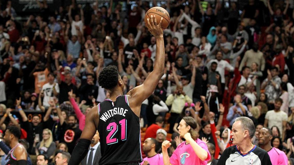 Center Hassan Whiteside reacts as the Miami Heat win 101-99 over the Houston Rockets at the AmericanAirlines Arena in Miami on Thursday, December 20, 2018.