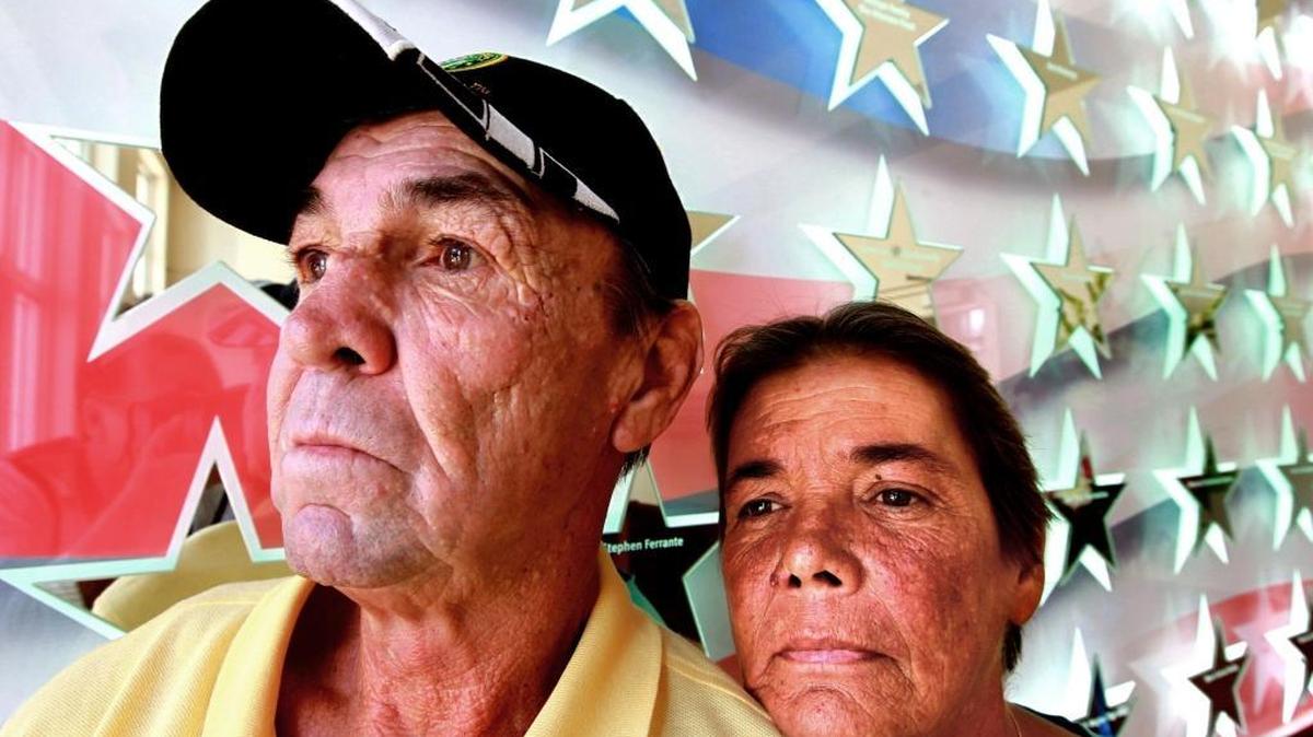 Former U.S. Army soldier Dennis Robinson and his wife, Mary, in the lobby of the United Way of Broward County’s new Jean and David Colker Center in Fort Lauderdale.