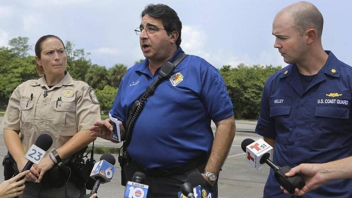 Mike Jachles, center, Broward Sheriff’s Office Fire Rescue public information officer, shares information during a news conference in Dania Beach on Saturday, Sept. 3, 2016, after a small plane crashed offshore, killing two people. With Jachles are Amy Moore, left, Florida Fish & Wildlife Conservation Commission public information officer, and U.S. Coast Guard Lt. Cmdr. Ryan Kelley, 7th District public information officer.