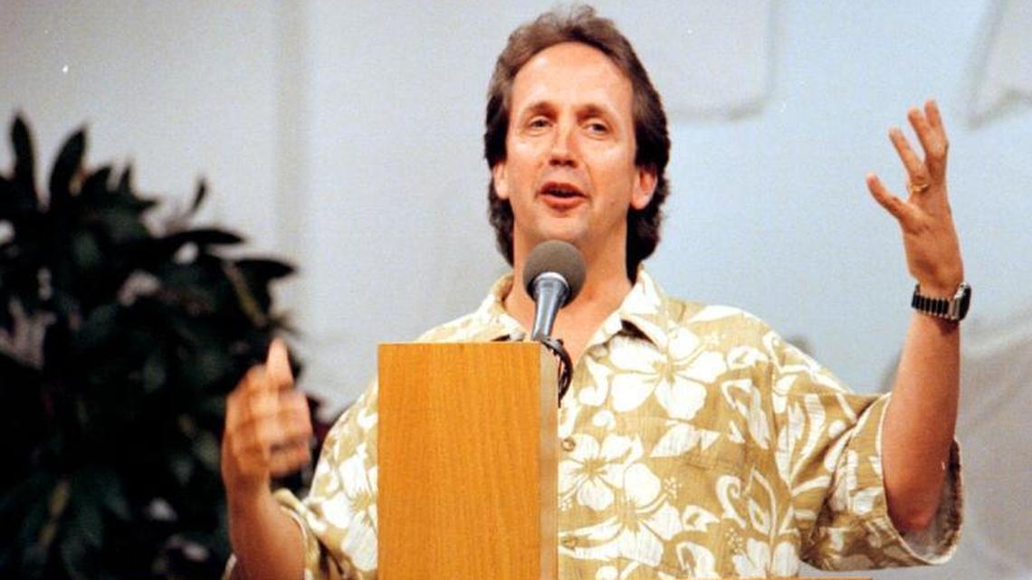Pastor Robert Coy, leading a service at Calvary Chapel in Pompano Beach, in April 1996.