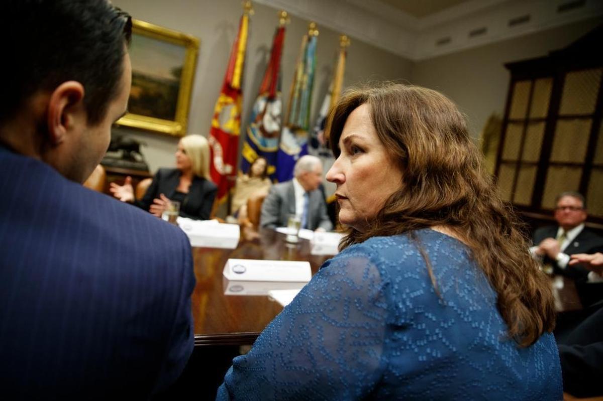 Parkland Mayor Christine Hunschofsky attends a meeting with President Donald Trump and state and local officials on school safety in the Roosevelt Room of the White House, Thursday, Feb. 22, 2018, in Washington.