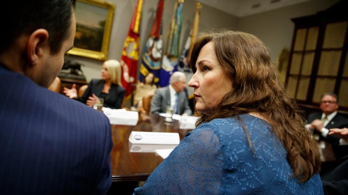 Parkland Mayor Christine Hunschofsky attends a meeting with President Donald Trump and state and local officials on school safety in the Roosevelt Room of the White House, Thursday, Feb. 22, 2018, in Washington.