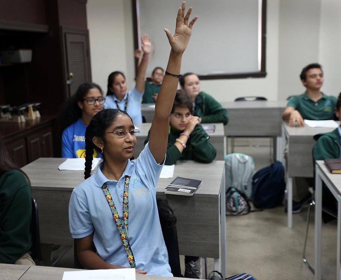 Vasundara Govindarajan, 13, answers a question in Dario Prepelitchi's seventh-grade civics class at Archimedean Academy on Tuesday, May 9, 2017. Vasundara will represent Miami in the Scripps National Spelling Bee.