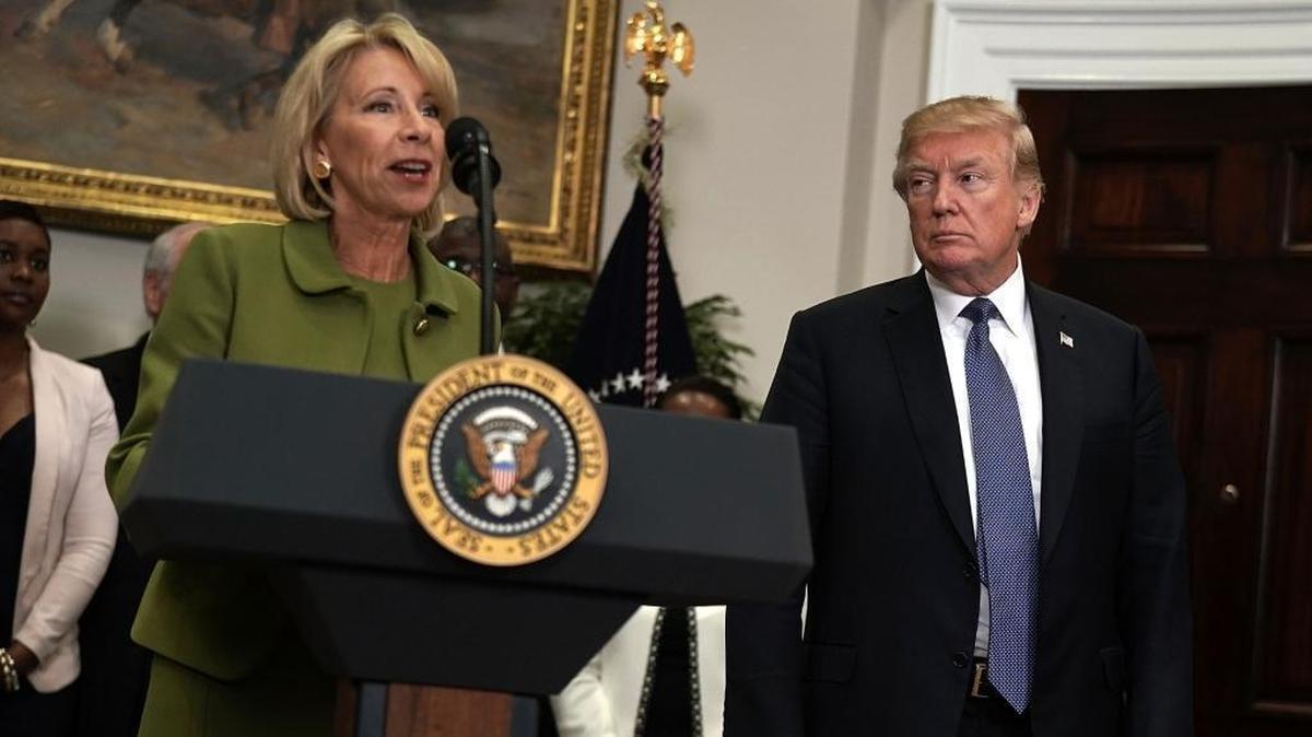 U.S. Secretary of Education Betsy DeVos and President Donald Trump in the Roosevelt Room of the White House on Feb. 27, 2018, in Washington. DeVos visited Marjory Stoneman Douglas High School on March 7, 2018.