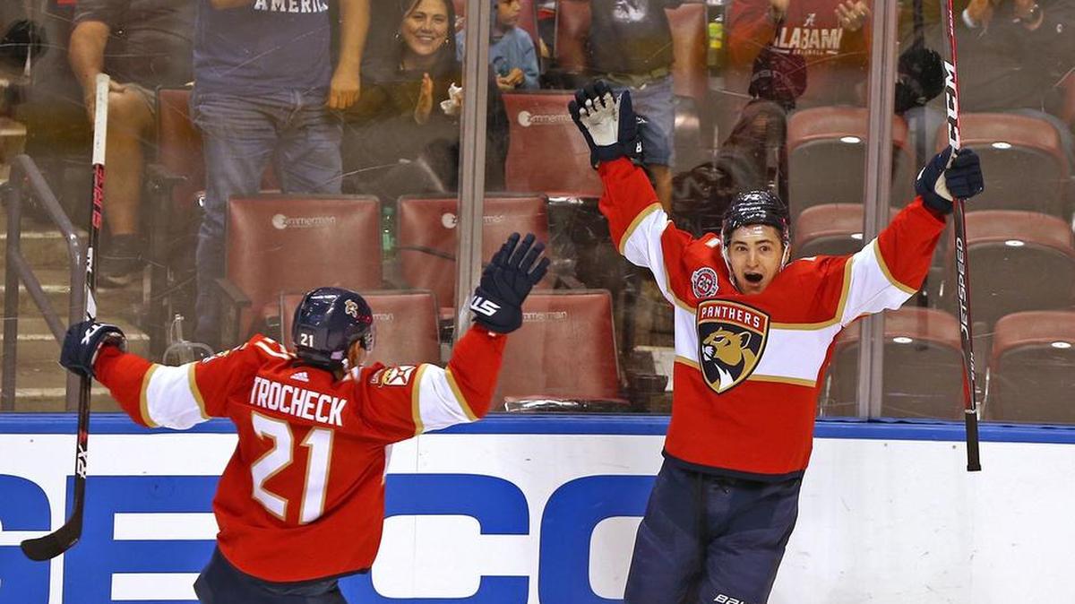 Florida Panthers center Vincent Trocheck (21) congratulates center Frank Vatrano (72) after he scores the team’s fifth goal in the second period in Sunday’s home victory over the Ottaway Senators.
