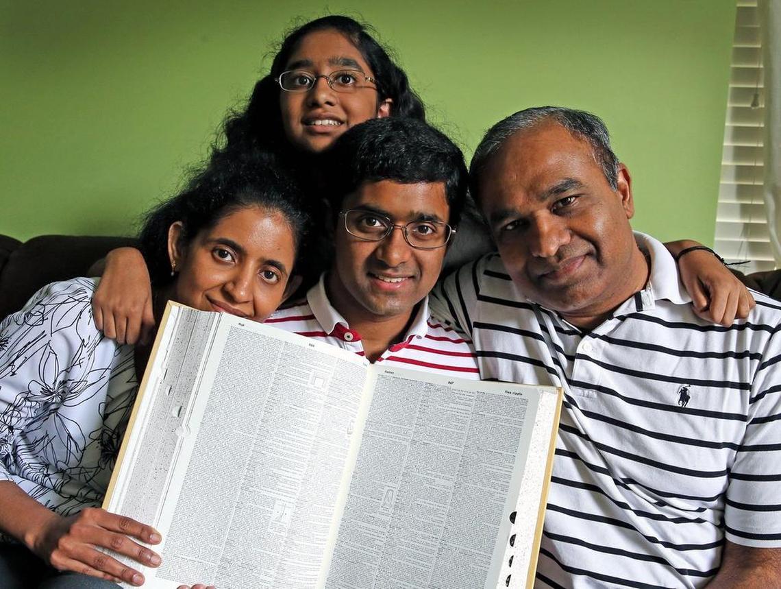 Sujatha Govindarajan, with her son Vaidya, 19, daughter Vasundara 13, and her husband Muthiah Govindarajan at their West Miami-Dade home, April 22, 2017. Vasundara Govindarajan has won the spelling be three times and will represent Miami in the Scripps National Spelling Bee in May. She studies about an hour a day and crams on the weekend with help from her dad and brother, who was also a spelling champion.