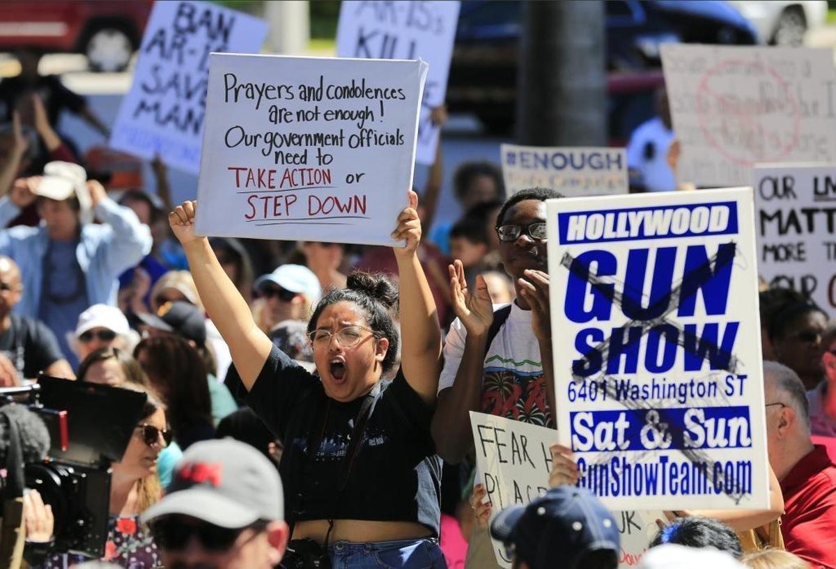 People rally for gun control Saturday, Feb. 17, 2018, in Fort Lauderdale.