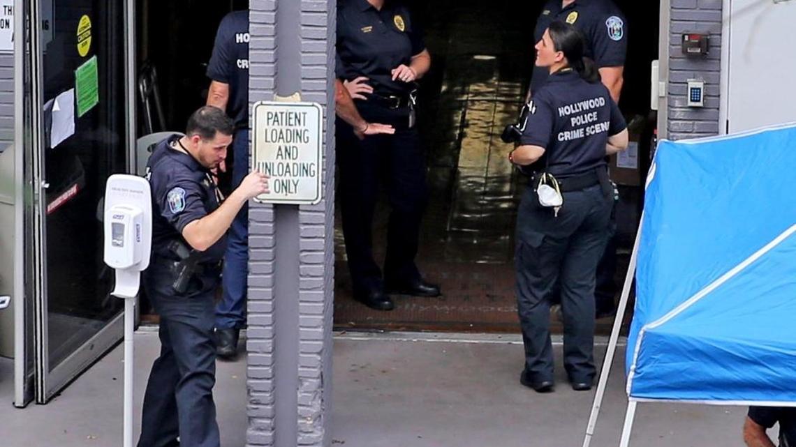 Hollywood police gather in a staging area at the south entrance of the Rehabilitation Center at Hollywood Hills on Sept. 13, 2017. Eleven residents of the home died amid stifling heat after Irma struck South Florida, knocking out power, including the center’s air conditioning. The deaths are the subject of a criminal investigation.