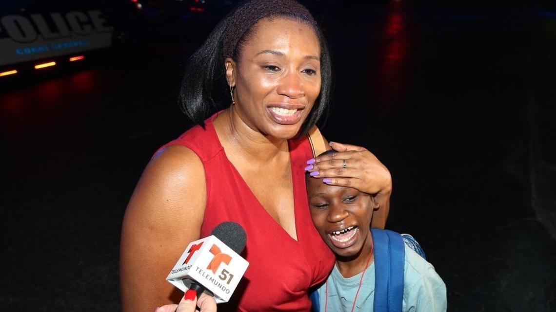 Sheree Spaulding comforts her 15-year-old son Justin after she had no contact with him for several hours after a shooting at his school, Marjory Stoneman Douglas High in Parkland, on Wednesday afternoon, Feb. 14, 2018. They reunited at the Marriott Heron Bay with other parents and students.