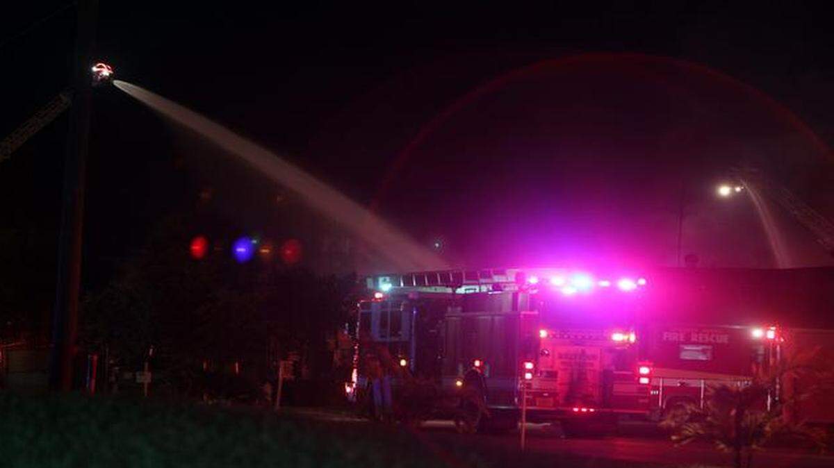
Firefighters respond to a three-alarm fire at 2121 SW 58th Ter. in West Park, Wednesday, Jan 21., 2015.
