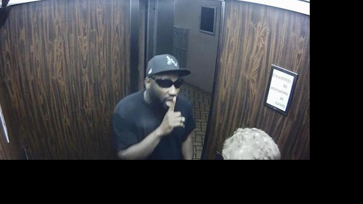 
A robber ambushes a woman in the elevator. The doors closed in his face after he took her purse.
