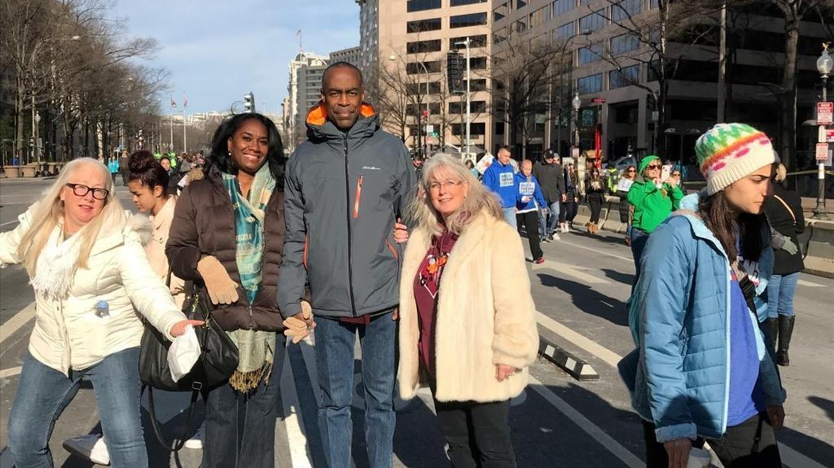 Broward County Schools Superintendent Robert Runcie leaves his Washington, D.C., hotel for March For Our Lives with School Board member Abby Freedman on one arm and his wife on the other, Saturday, March 24, 2018.
