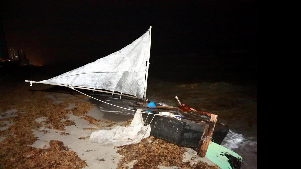 
Migrants came ashore in this boat. 
