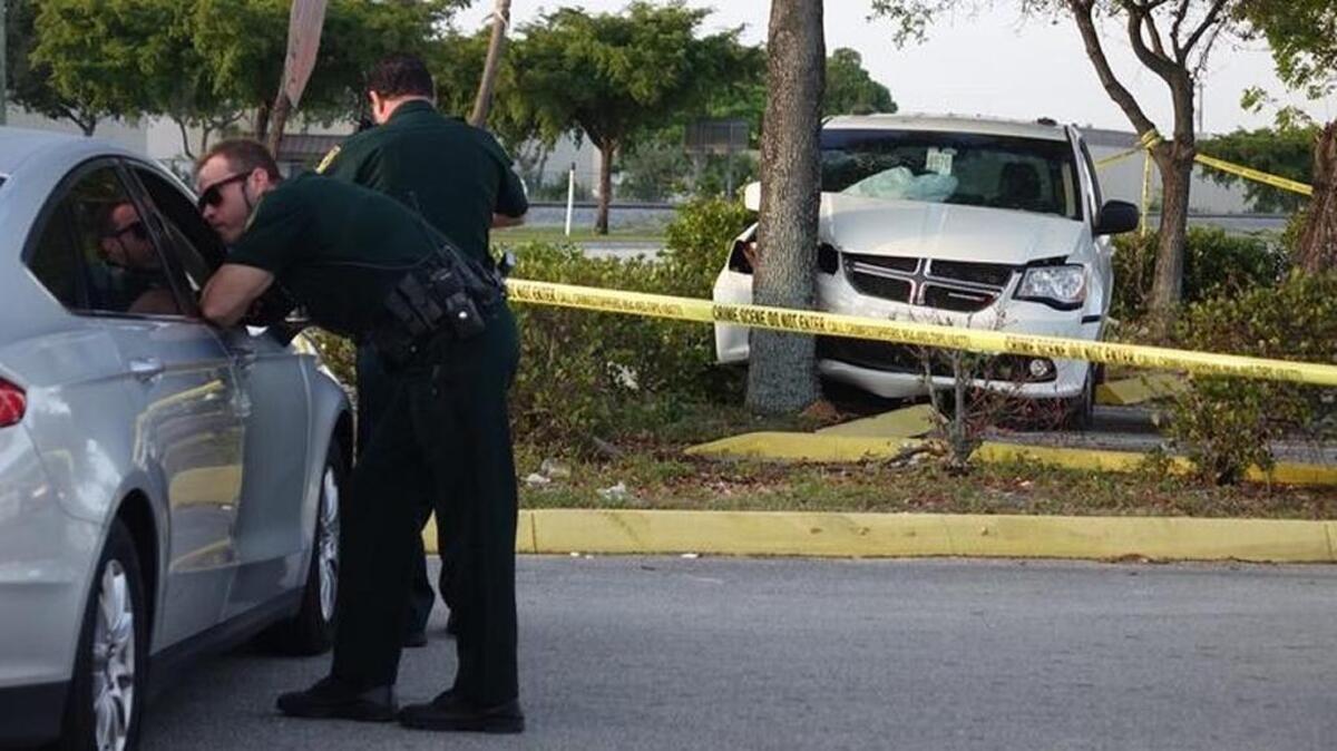 Broward Sheriff's deputies at the scene of a shooting in which a Broward deputy was shot at and returned gunfire in Deerfield Beach on Monday, May, 15, 2017.