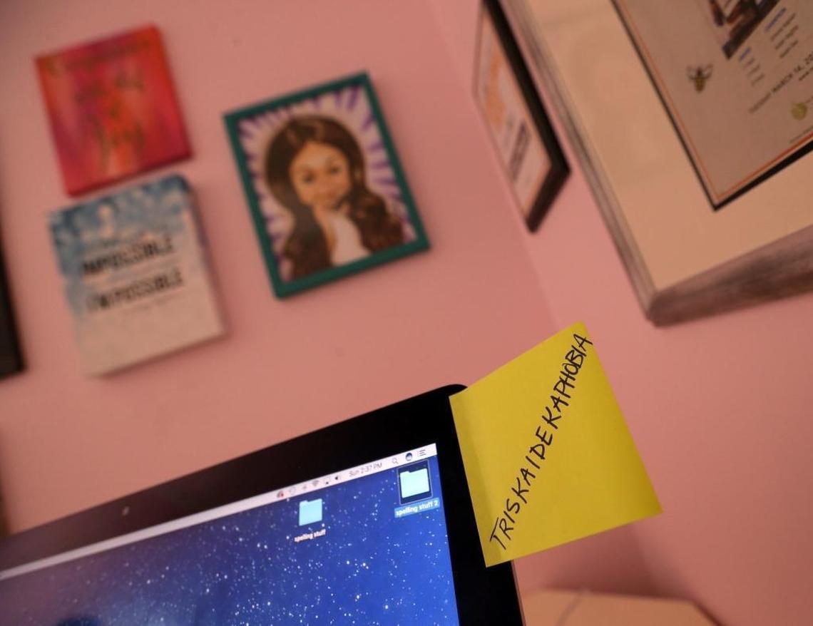 Simone Kaplan, 11, has a post-it with the word “triskaidekaphobia” attached to her computer as she studies on Sunday, May 21, 2017. Simone is headed to the Scripps National Spelling Bee in Washington, D.C., where she will be wearing the number 13, and triskaidekaphobia means the extreme superstition regarding the number 13. Simone is a student at St. Bonaventure Catholic School in Davie.
