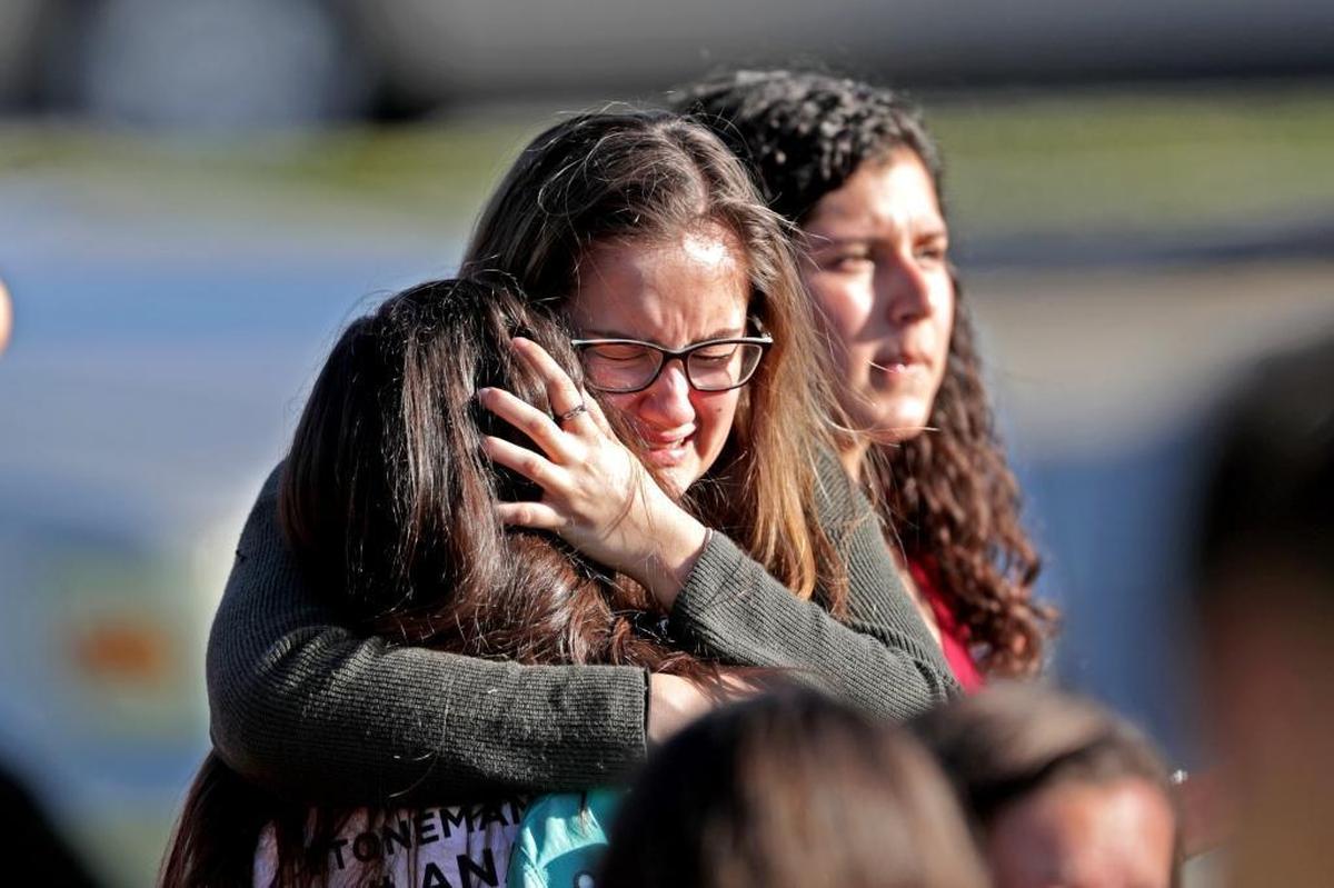 Students are released from a lockdown outside of Marjory Stoneman Douglas High School.