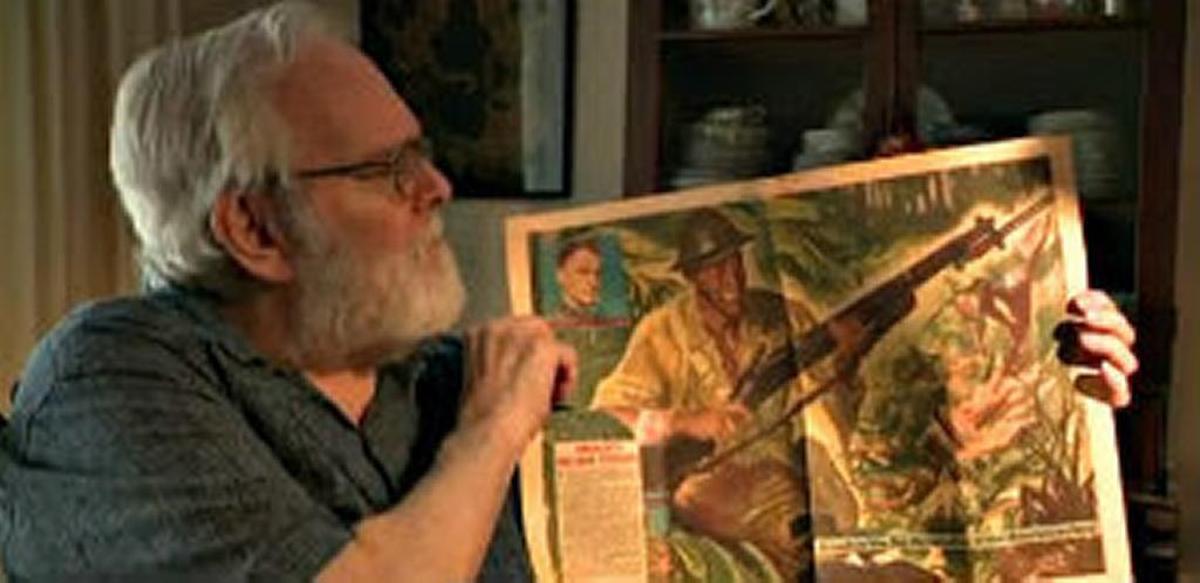 John A. Patterson holds a March 21, 1942, copy of a New York Journal story about his uncle, World War II Medal of Honor winner Alexander ‘Sandy’ Nininger Jr.